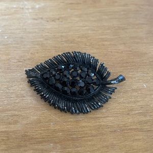 Vintage Black Rhinestone and Japanned Metal Domed Pointed Leaf Brooch